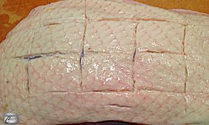 Be careful just to score the skin and not the meat of the breast.