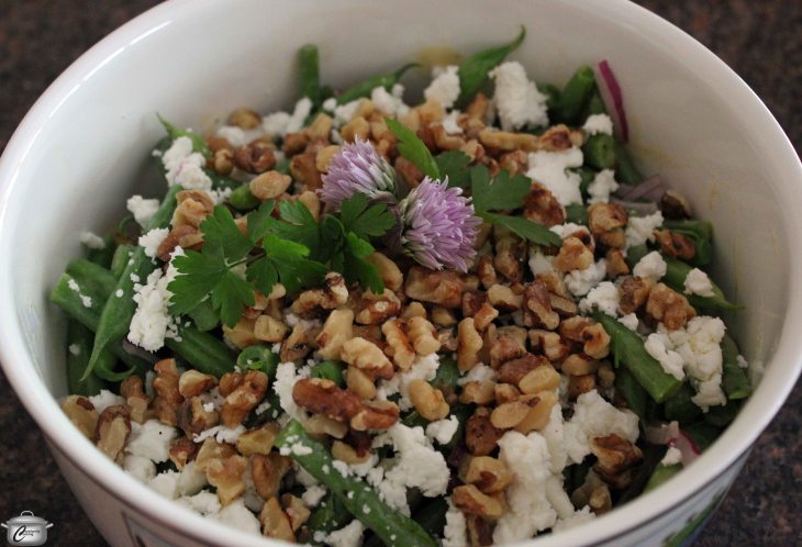 This salad is a nice way to dress up green beans. It's a great side dish for fish, chicken or roasted/grilled meat. It would even make a nice lunch on its own. 