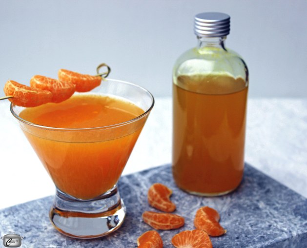 A turmeric and ginger infused simple syrup with freshly squeezed orange juice and vodka makes a delicious and nutritious cocktail!