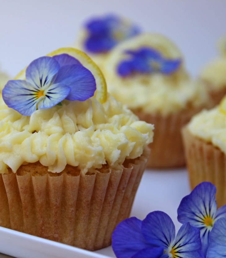 cupcakes made with hard iced tea malt beverage topped with lemon buttercream