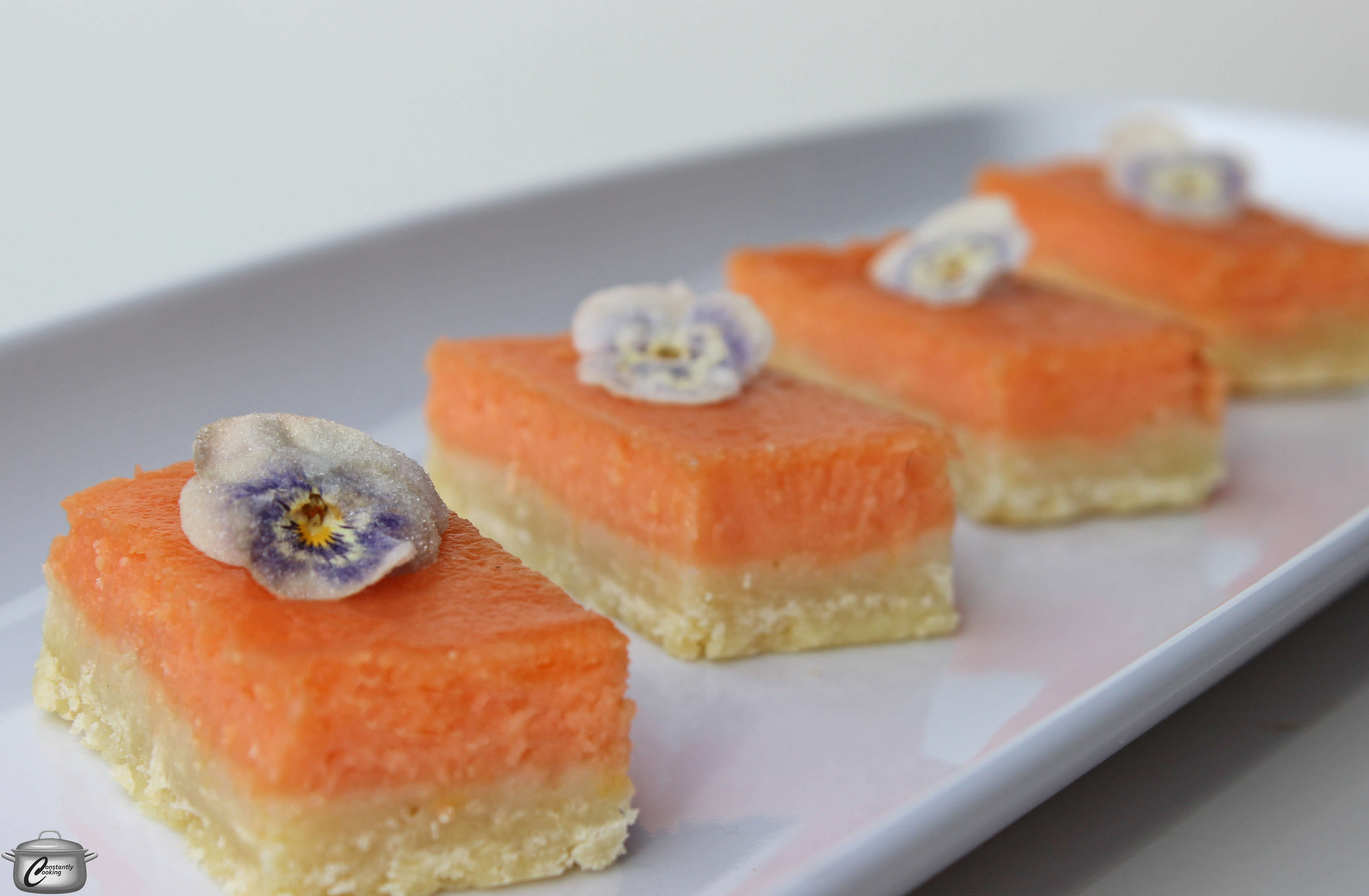 Tangy grapefruit and vanilla custard layered over a shortbread base make for a truly delicious dessert