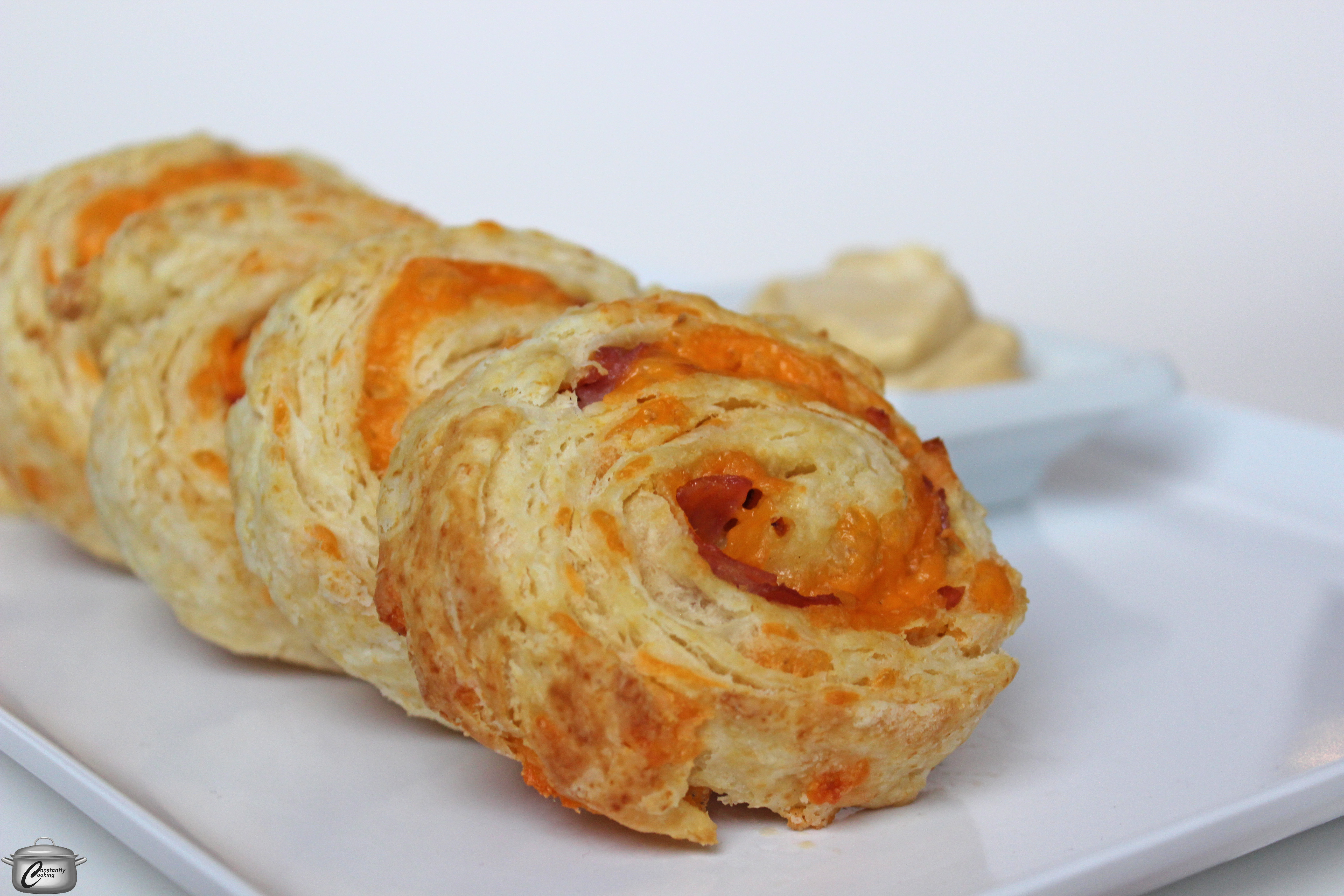 Buttery, flaky biscuit dough rolled up with a ham and cheese filling